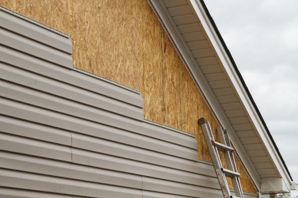 Grey Vinyl Siding Installation in Kingwood