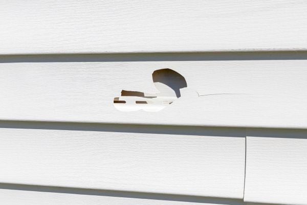 White Vinyl Siding Repair in Kingwood